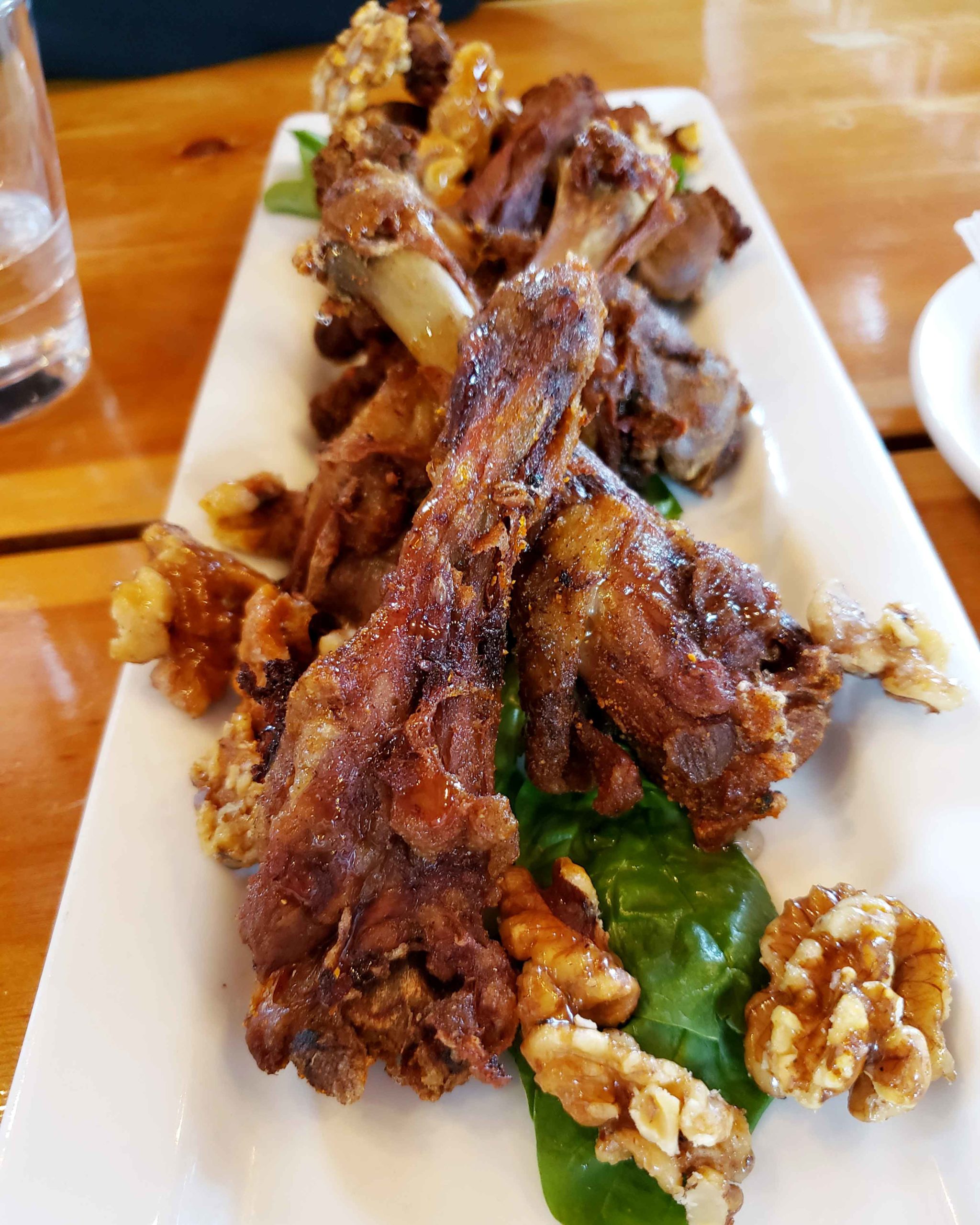 An appetizer of duck wings ordered during lunch at the Iron Goat